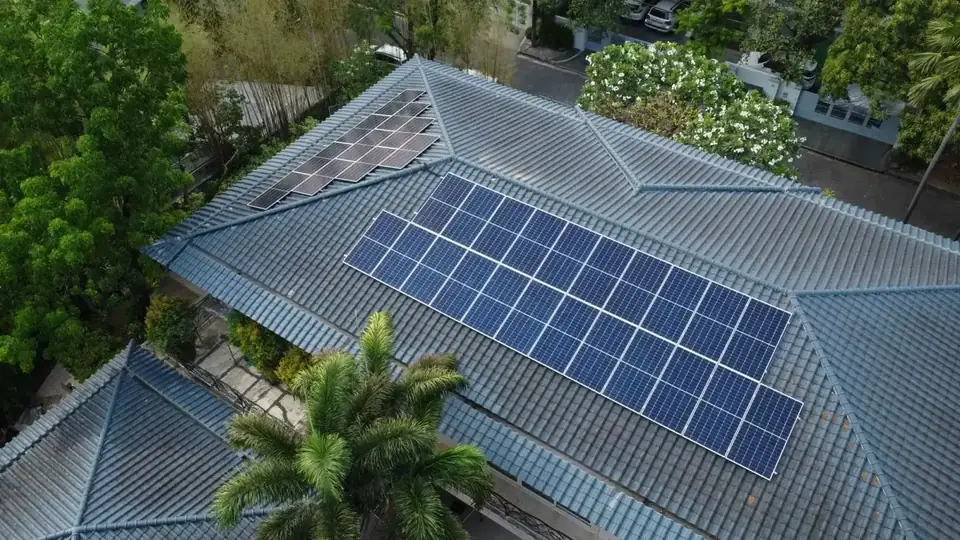 Aerial view of a home with rooftop solar panels